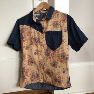 Vintage-inspired collared western shirt with ivory pearl snaps